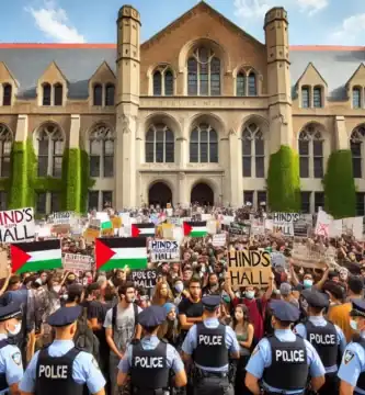 DALL·E 2024 06 23 14.07.37 A large group of university students protesting outside an academic building holding signs and banners with pro Palestinian messages. The building ha