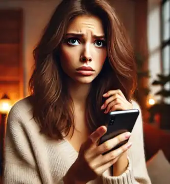 DALL·E 2024 06 23 12.35.23 A beautiful young woman with medium skin and brown hair looking very worried as she receives a call. She is holding her smartphone and looking at it w