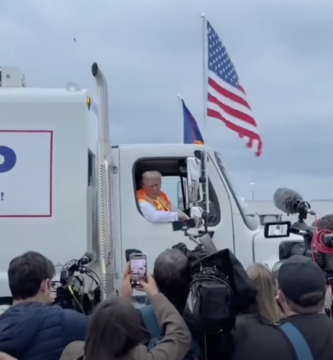 trump in a garbage truck