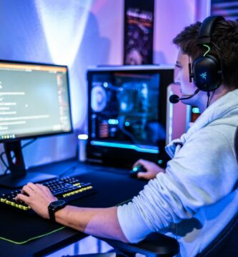 How to See Discord Recap a man wearing a headset sitting at a computer desk