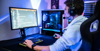 How to See Discord Recap a man wearing a headset sitting at a computer desk