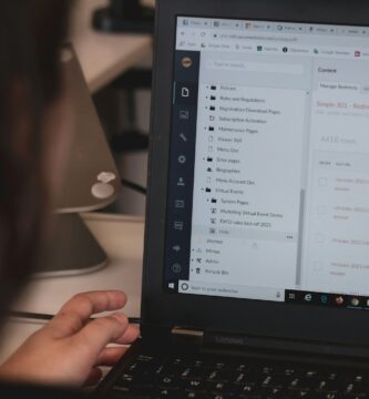 Prompt Generator person using black laptop computer