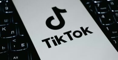 Pixverse AI trend Tiktok logo on a laptop keyboard