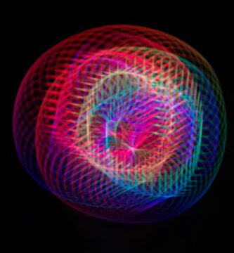 How to Use Dictation on Mac a colorful ball of light on a black background