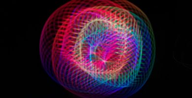 How to Use Dictation on Mac a colorful ball of light on a black background